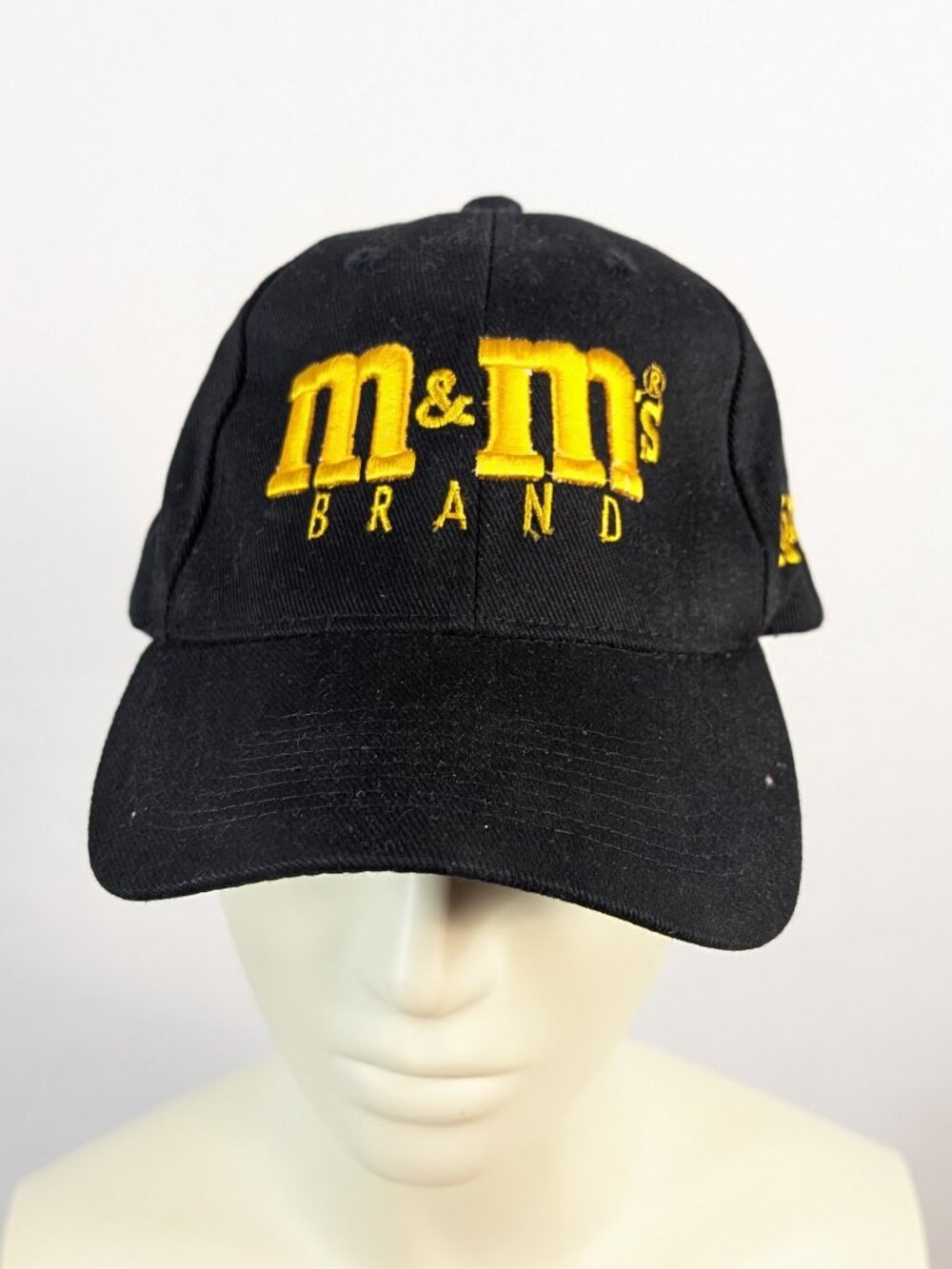 M&Ms Brand black hat OSFA adjustable
